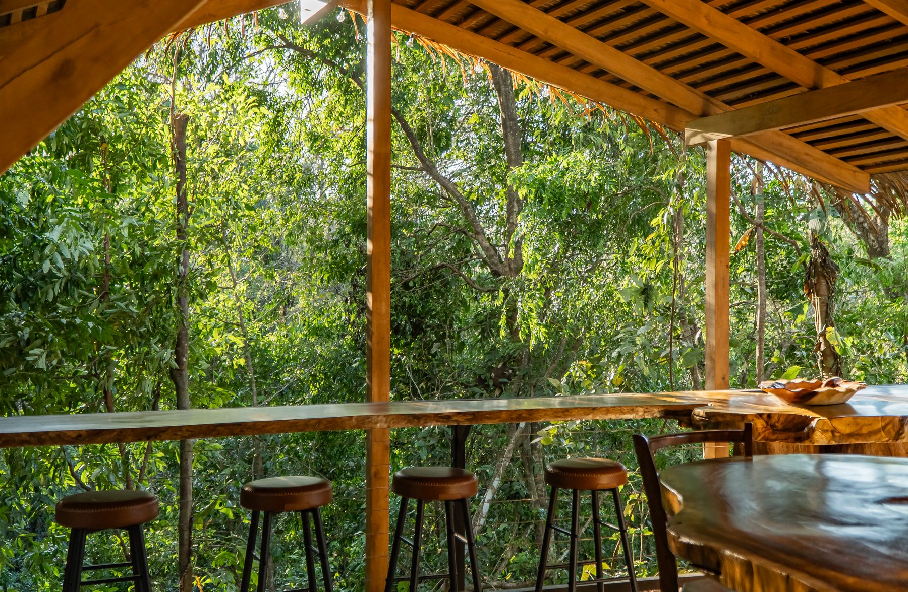 Casa Bali open-air bar and forest view